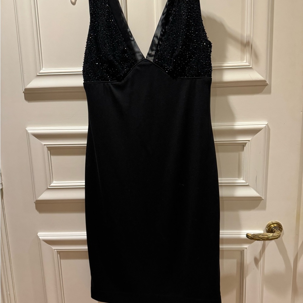 Cache black cocktail dress.